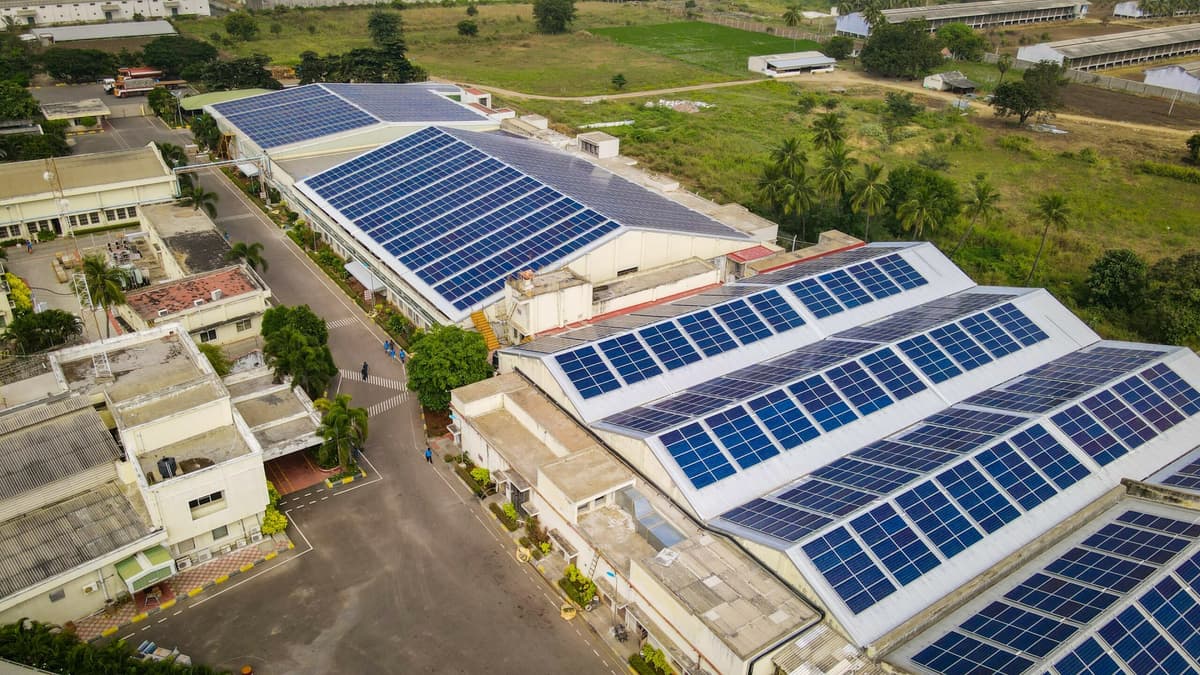Modern commercial building with solar panels on rooftop