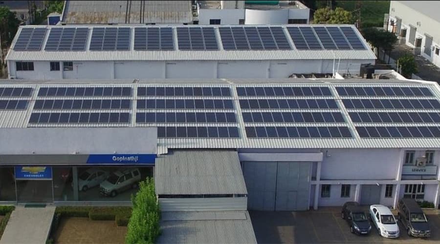 Large industrial facility with solar panel installation